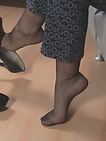 Larissa`s shoe dangling and feet teasing in black sheer nylons