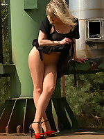 Outsite in black skirt and suntan pantyhose