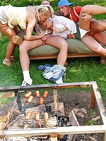 Large group of people having groupsex during outdoor BBQ