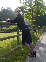 Sexy office girl Larissa takes a stroll far transmitted to countryside after a day far transmitted to office still enervating her suit and keen-minded black toffee-nosed heels
