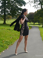 A tight black dress and side-splitting ridiculous toffee-nosed stiletto heels gets this dark haired stunner in the mood for some outdoor fun