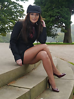 Amazing babe Faye shows off her amazing toes enervating a short skirt, nylons and a pair of tall stiletto heels